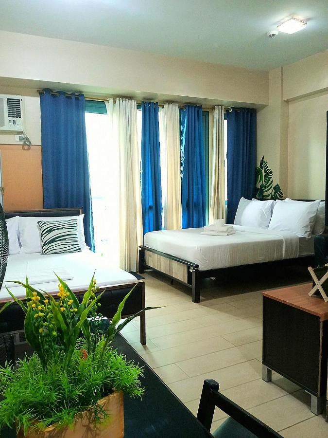 The Palm Tree Condotel Airport Apartment