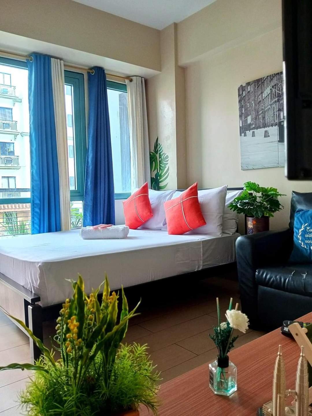 The Palm Tree Condotel Airport Apartment